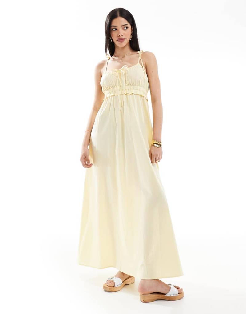 Esmée - Exclusive - Maxi-Strandkleid in Buttergelb mit gebundenen Trägern und Schleifendetail von Esmée