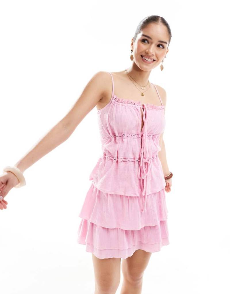 Esmée Exklusiv - Vorne gebundenes cropped Strand-Top in Staubrosa von Esmée