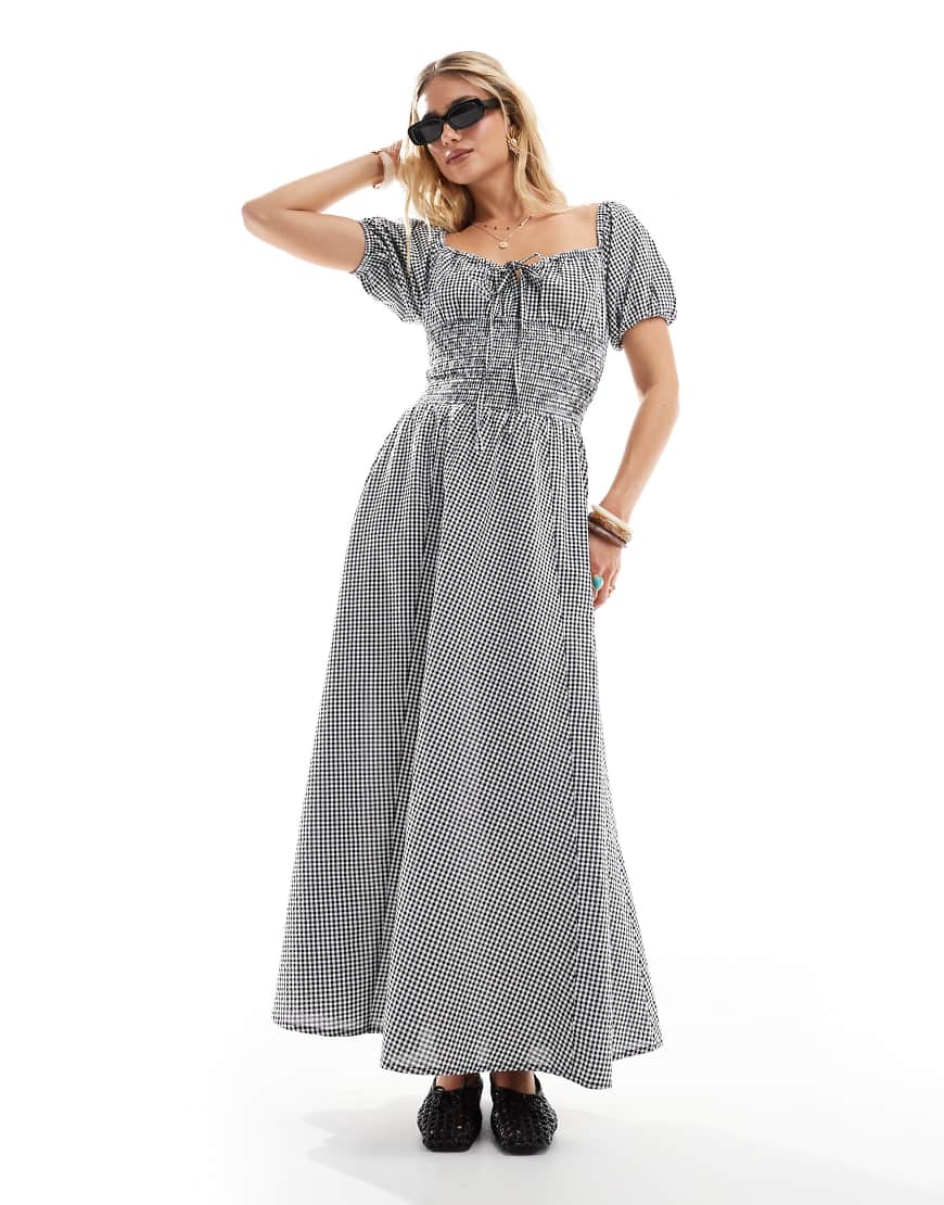 Esmee - Exklusives Maxi-Strandkleid mit Vichy-Karomuster in Schwarz-Weiß, Puffärmeln und Schnürung vorne-Bunt von Esmée