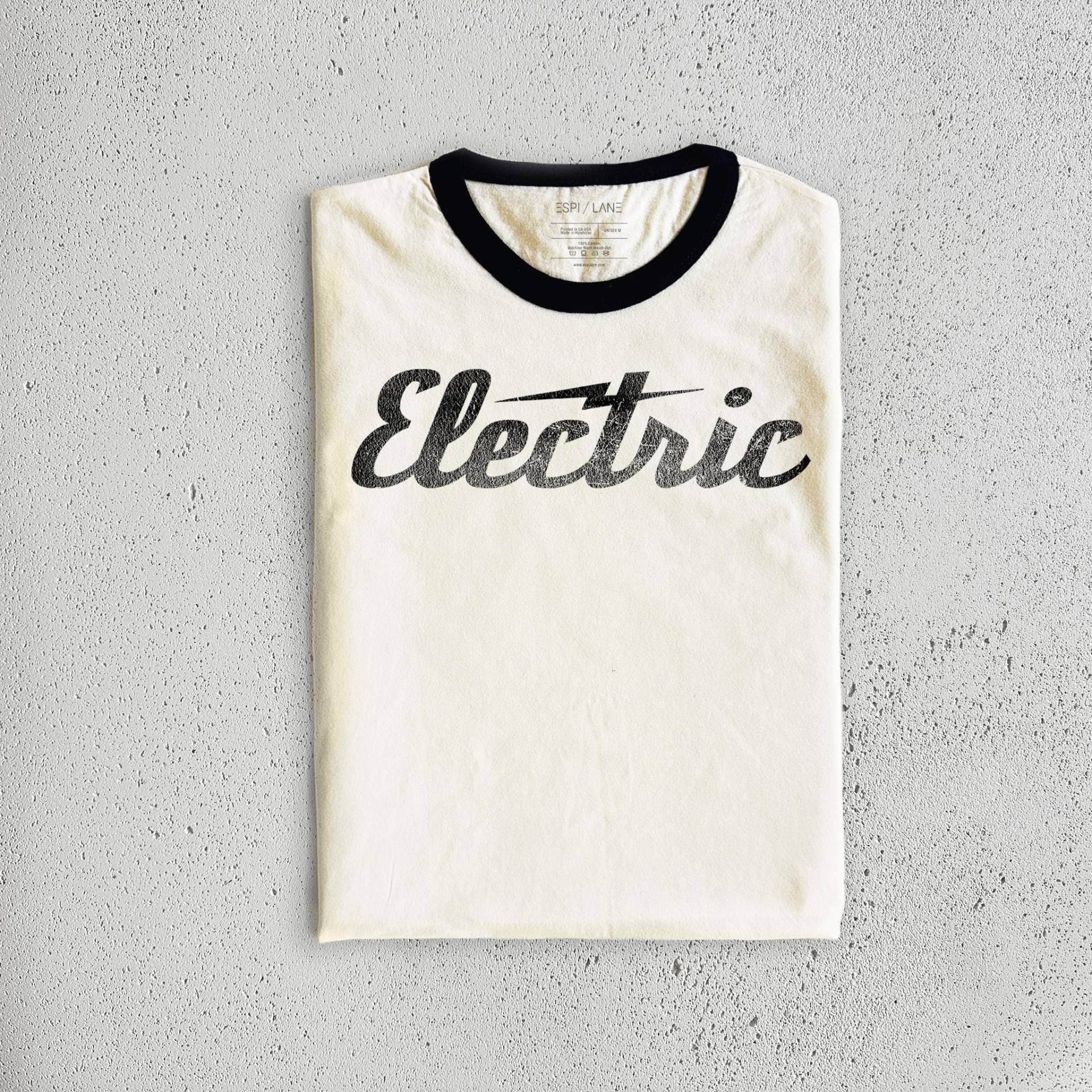 Elektrisierendes Grafik-T-Shirt | Vintage Style Distressed 70S Unisex T-Shirt von EspiLane