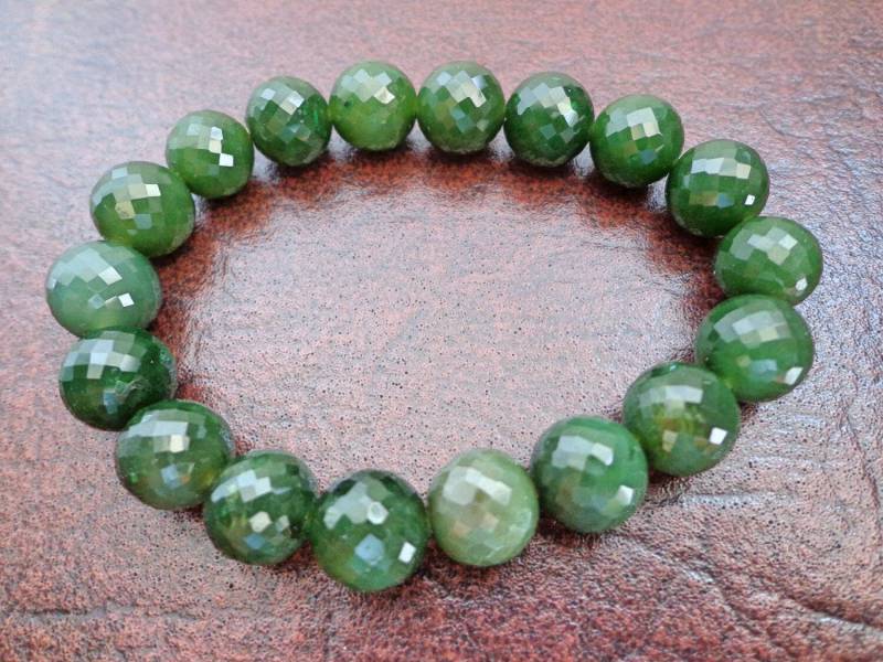 10 Mm Nephrit-Jade Facettiertes Rundes Perlenarmband. S442 10 Mm Nephrit-Jade Facettiertes Rundes Perlenarmband. S442 von Eximha