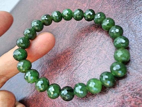 8 Mm Nephrit Jade Facettiertes Rundes Perlenarmband. S452 8 Mm Nephrit Jade Facettiertes Rundes Perlenarmband. S452 von Eximha