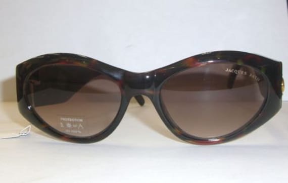 Original Vintage Jacques Fath Tortoise Shell Sonnenbrille Mit Gold Schnallen Akzente Original Vintage Jacques Fath Tortoise Shell Sonnenbrille Mit Gold Schnallen Akzente von EyewearMart