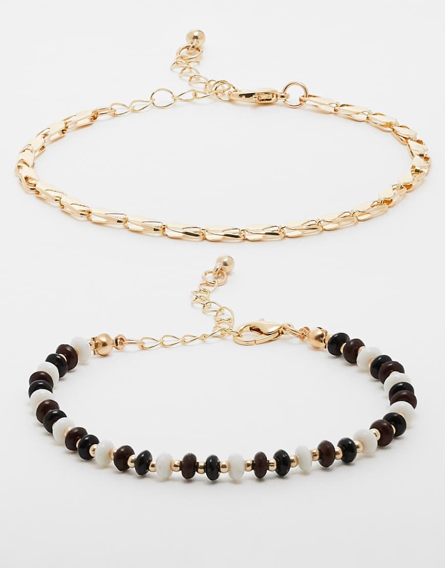 Faded Future - 2er-Pack goldfarbene Armbänder mit Perlen-Design Faded Future - 2er-Pack goldfarbene Armbänder mit Perlen-Design von FADED FUTURE