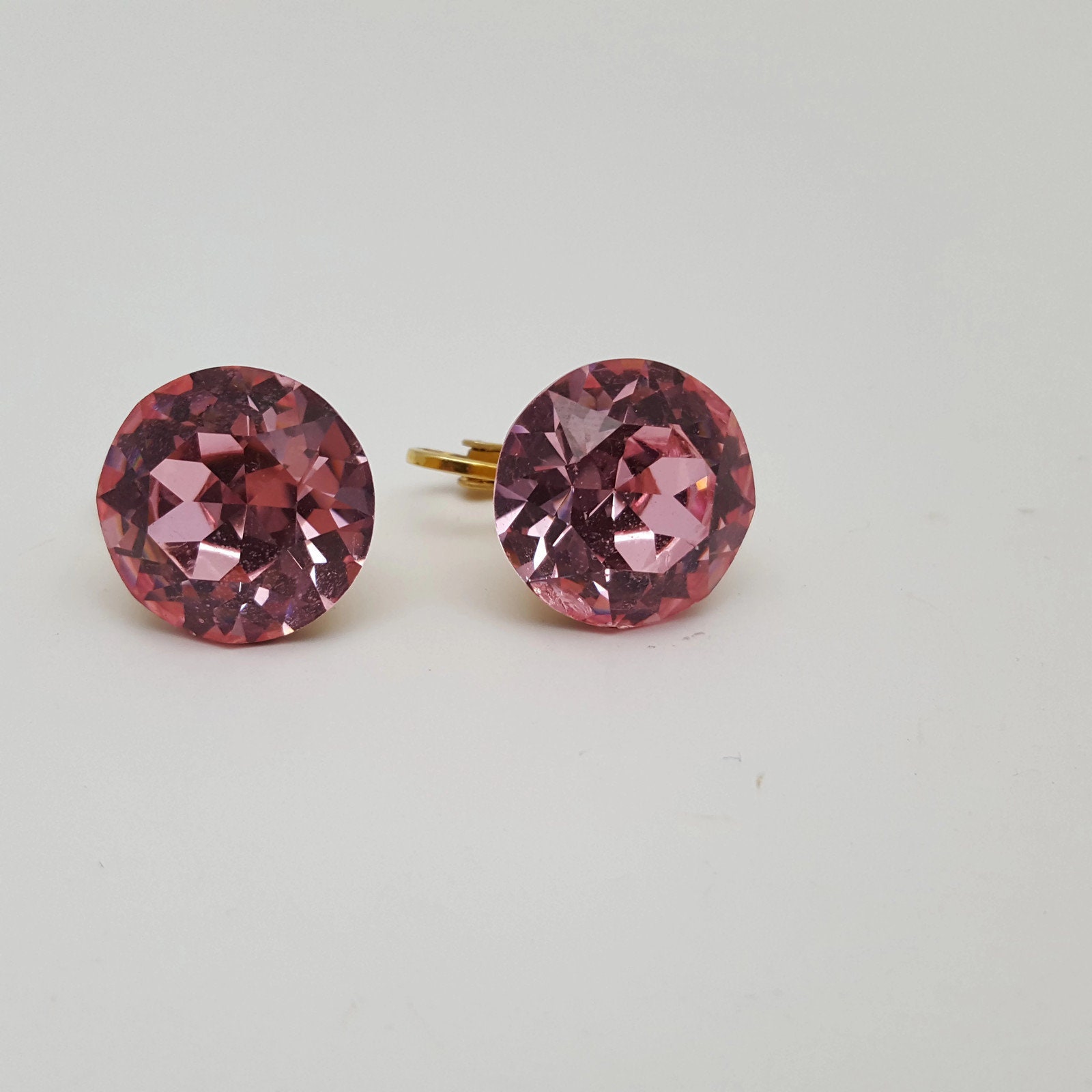 Vintage Vogue Pink Faceted Crystal Clip Ohrringe Vintage Vogue Pink Faceted Crystal Clip Ohrringe von FabFindsByJGerlach