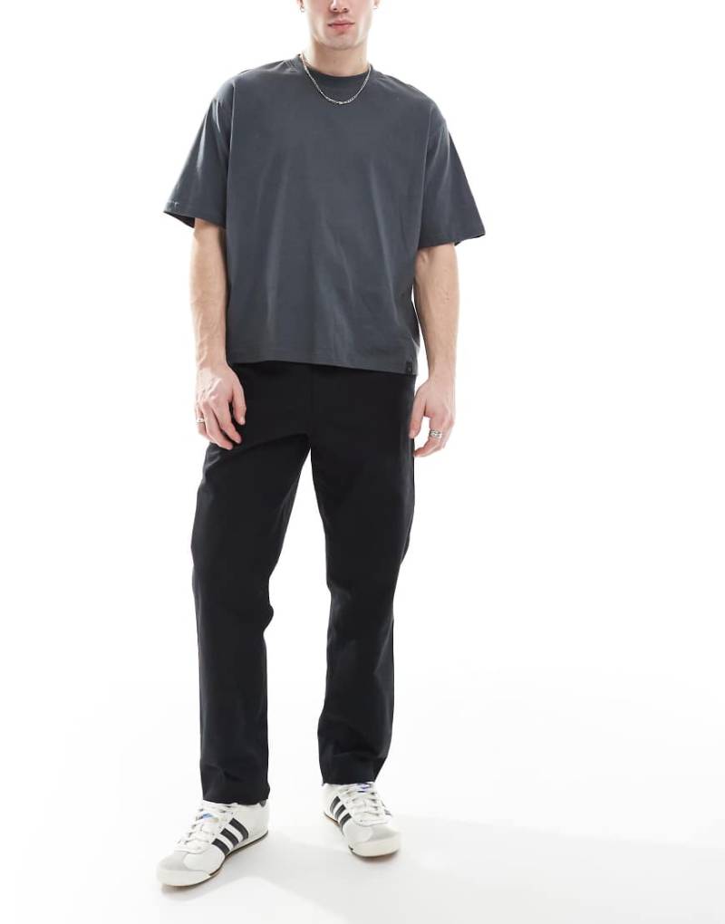 Farah - Hawtin - Schmal zulaufende Canvas-Hose in Schwarz von Farah