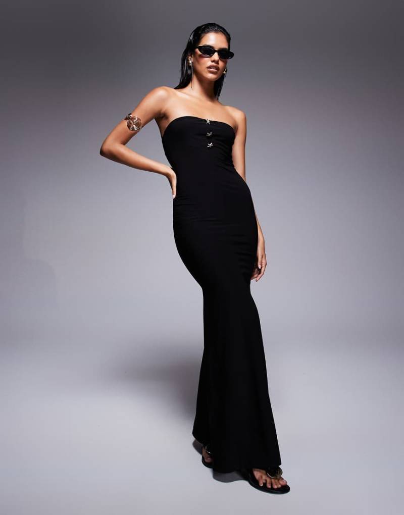 Fashionkilla - Doppellagiges, formendes und trägerloses Maxikleid aus anschmiegsamem Stoff in Schwarz mit Schwalbenschwanz-Saum und Seestern-Metallverzierungen von Fashionkilla