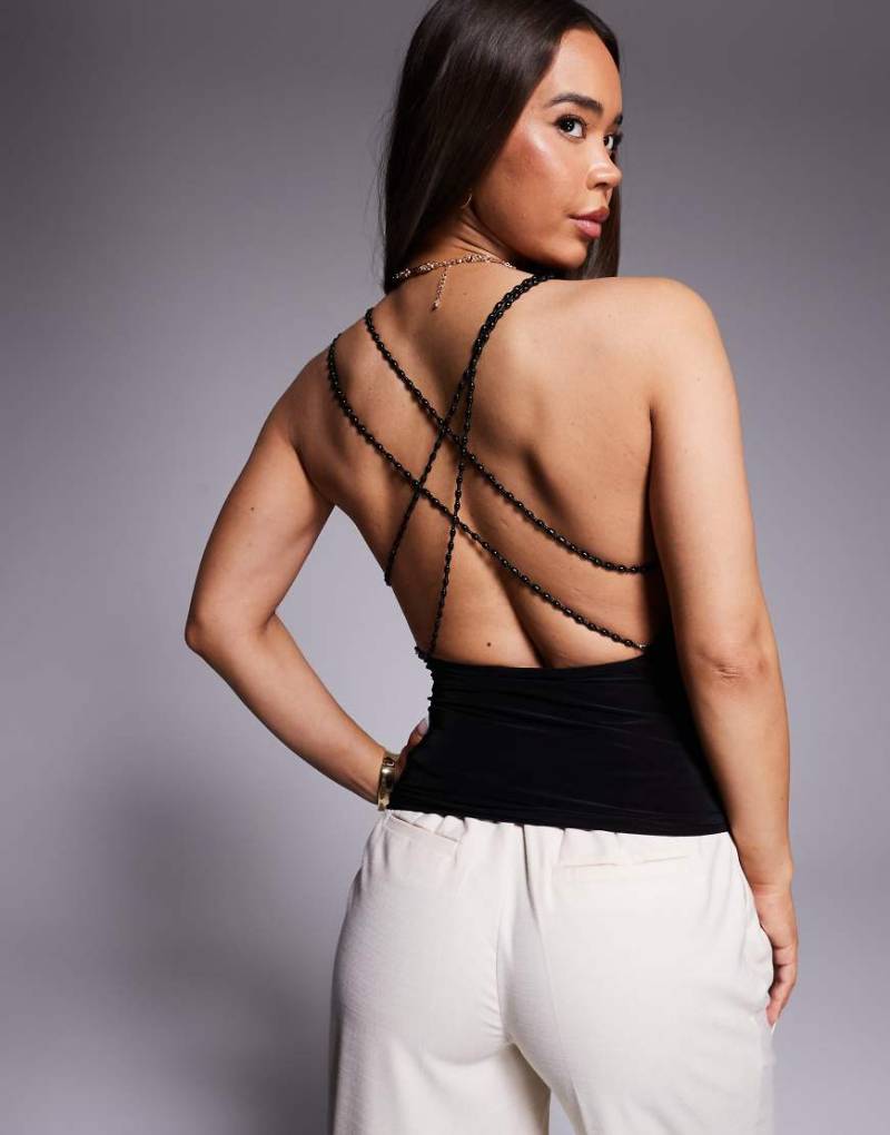 Fashionkilla - Exklusives, figurformendes Oberteil in Lagenoptik mit tiefem Rückenausschnitt mit Perlendetails und softem Griff-Schwarz von Fashionkilla