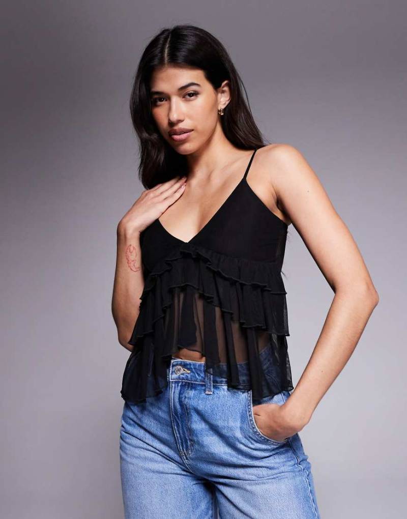 Fashionkilla - Gestuftes Camisole-Oberteil in Schwarz aus Netzstoff mit Rüschen an der Vorderseite von Fashionkilla