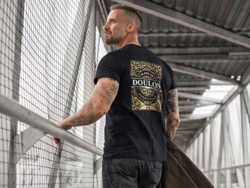 Doulos | Epüῦ̰λο◆ - Sklave Jesu Christi Kurzärmeliges Unisex-T-Shirt Doulos | Epüῦ̰λο◆ - Sklave Jesu Christi Kurzärmeliges Unisex-T-Shirt von MansfieldandCo