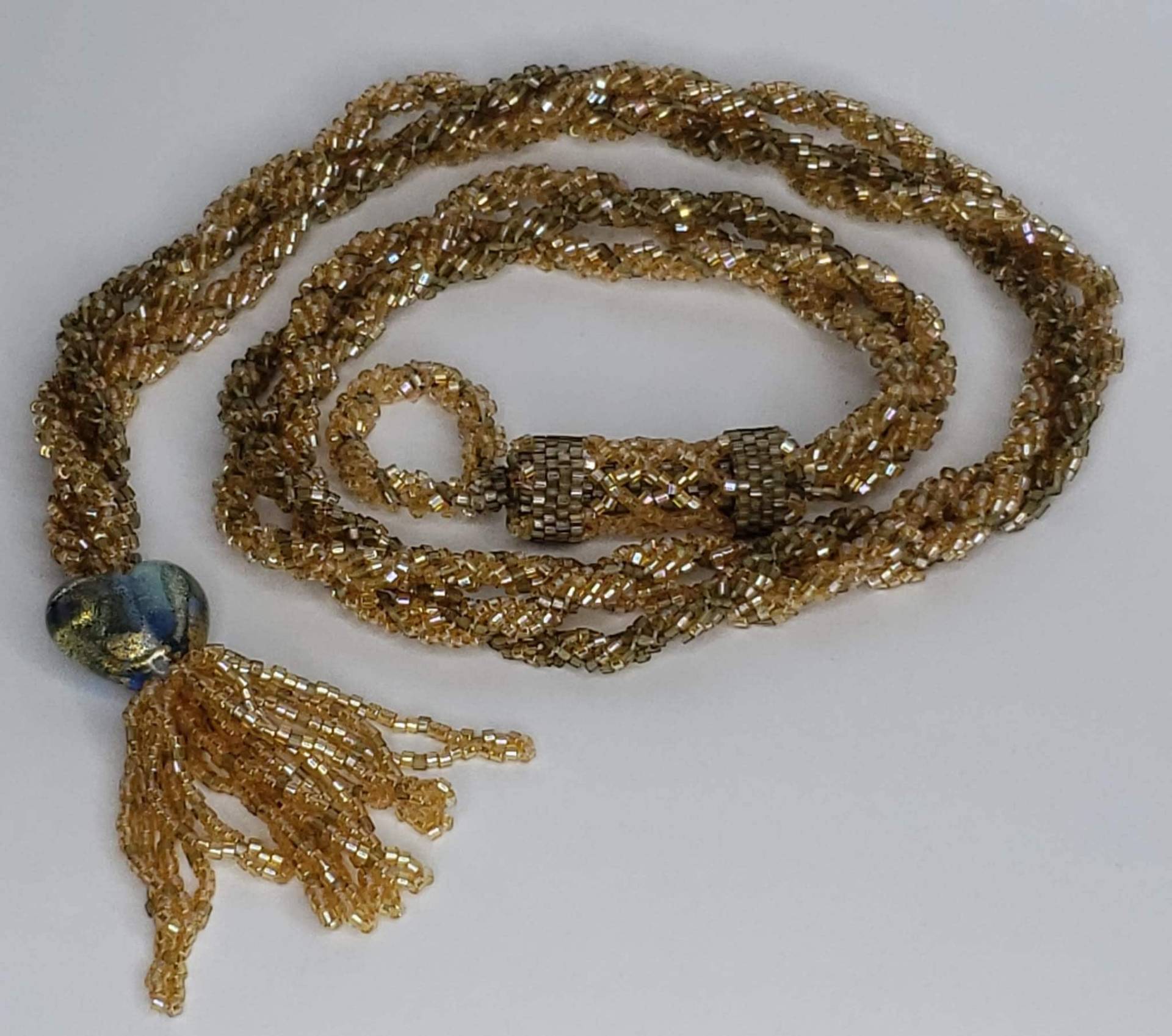 Seil Aus Gold Handperlen Lampwork Zarte Käfigperle Delica Glas-Perle 60 cm Seil Aus Gold Handperlen Lampwork Zarte Käfigperle Delica Glas-Perle 60 cm von ForestMuseDesigns