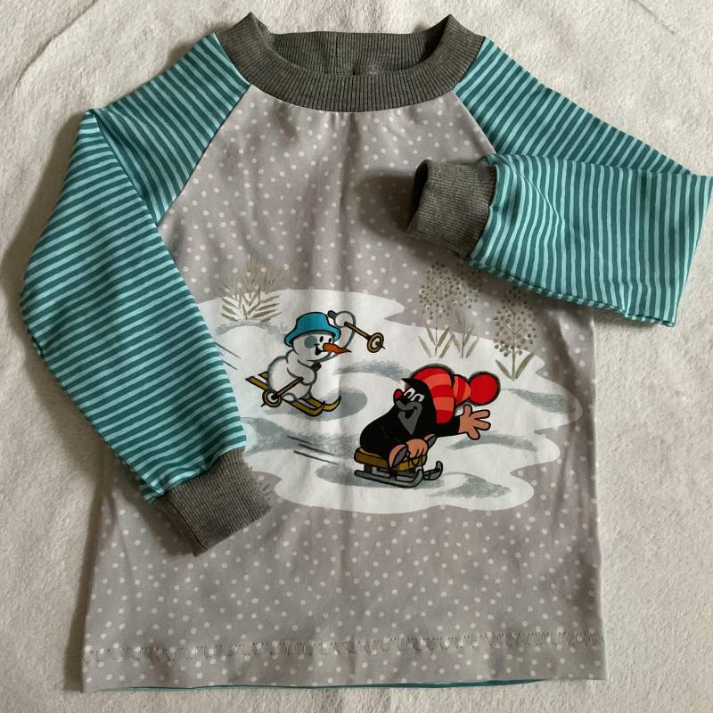 La-Shirt Gr. 104 Jersey "Pauli - Winterspaß" Streifen Blau Petrol Maulwurf Kindershirt Longsleeve Geschenk Winter Unisex Weihnachten von FrauMamaHaase