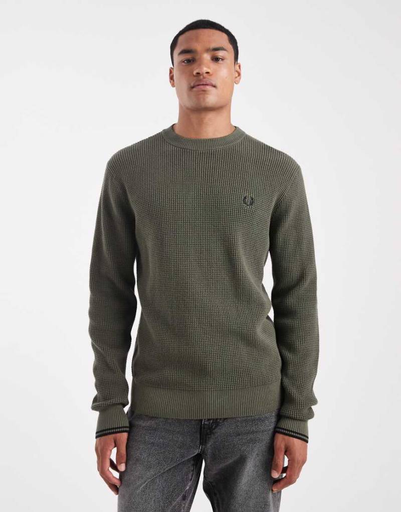 Fred Perry - Pullover in Khaki mit Waffelstruktur-Grün Fred Perry - Pullover in Khaki mit Waffelstruktur-Grün von Fred Perry