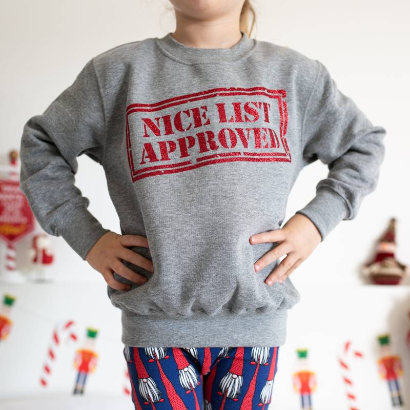 Weihnachtlicher Kinderpullover - Unisex Superschönes List Sparkle Design von FredandNoah