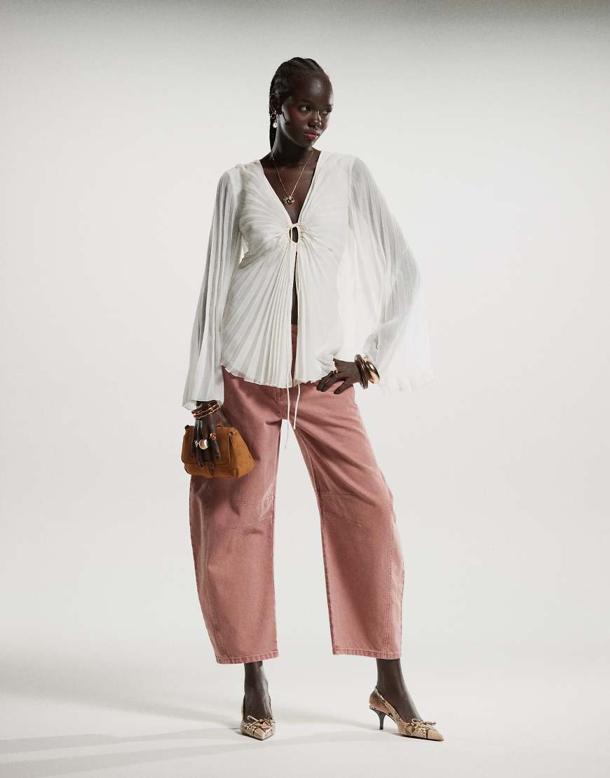 Free People - Good Luck - Jeans in Sonnenuntergangsrosa mit mittelhohem Bund und abgerundetem Beinschnitt von Free People