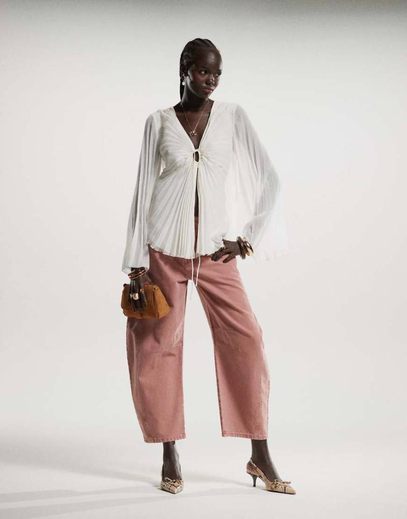 Free People - Good Luck - Jeans in Sonnenuntergangsrosa mit mittelhohem Bund und abgerundetem Beinschnitt von Free People