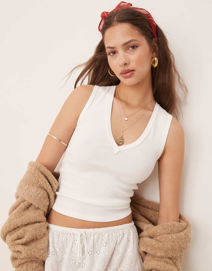 Free People - Neria - Tanktop in Elfenbein mit V-Ausschnitt-Weiß Free People - Neria - Tanktop in Elfenbein mit V-Ausschnitt-Weiß von Free People