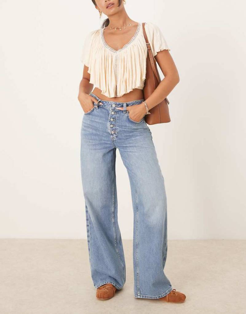 Free People - Nia - Lässige Boyfriend-Tasche in hellblauer Waschung von Free People