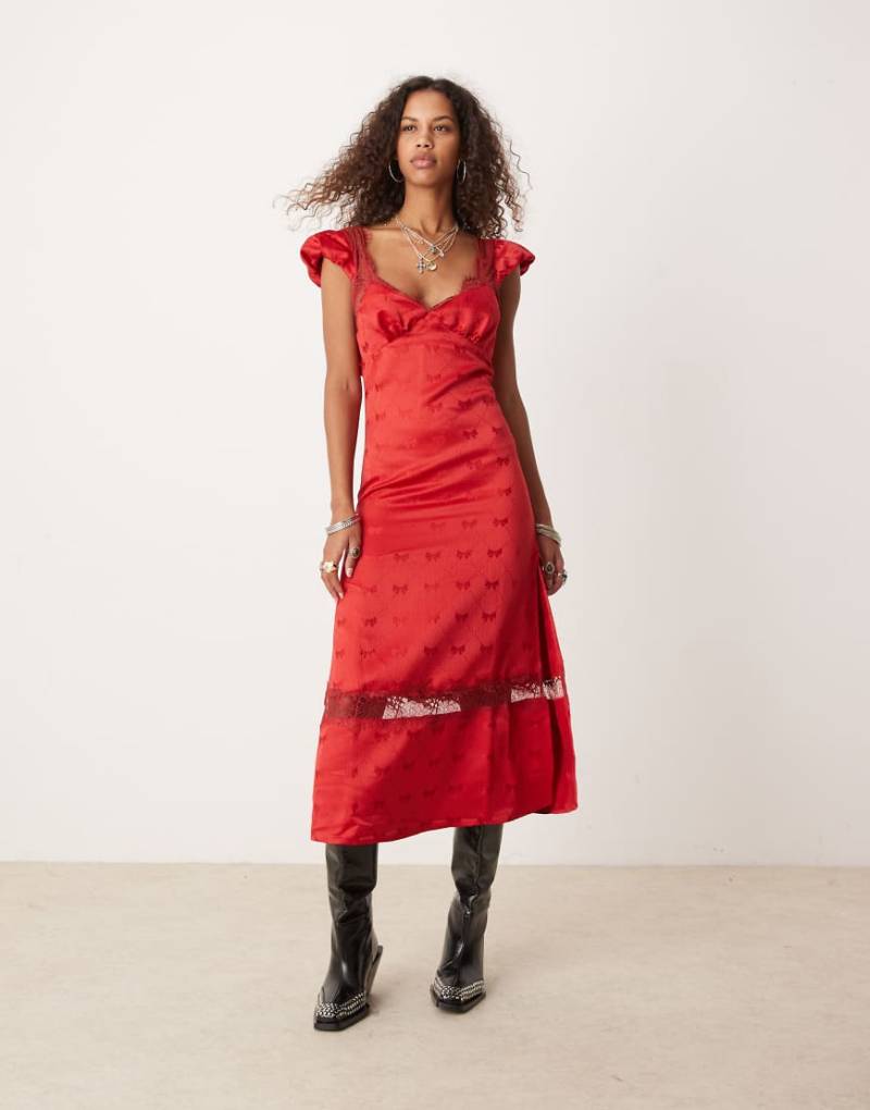 Free People - Satin-Midikleid in Rot mit Schleifenmuster von Free People