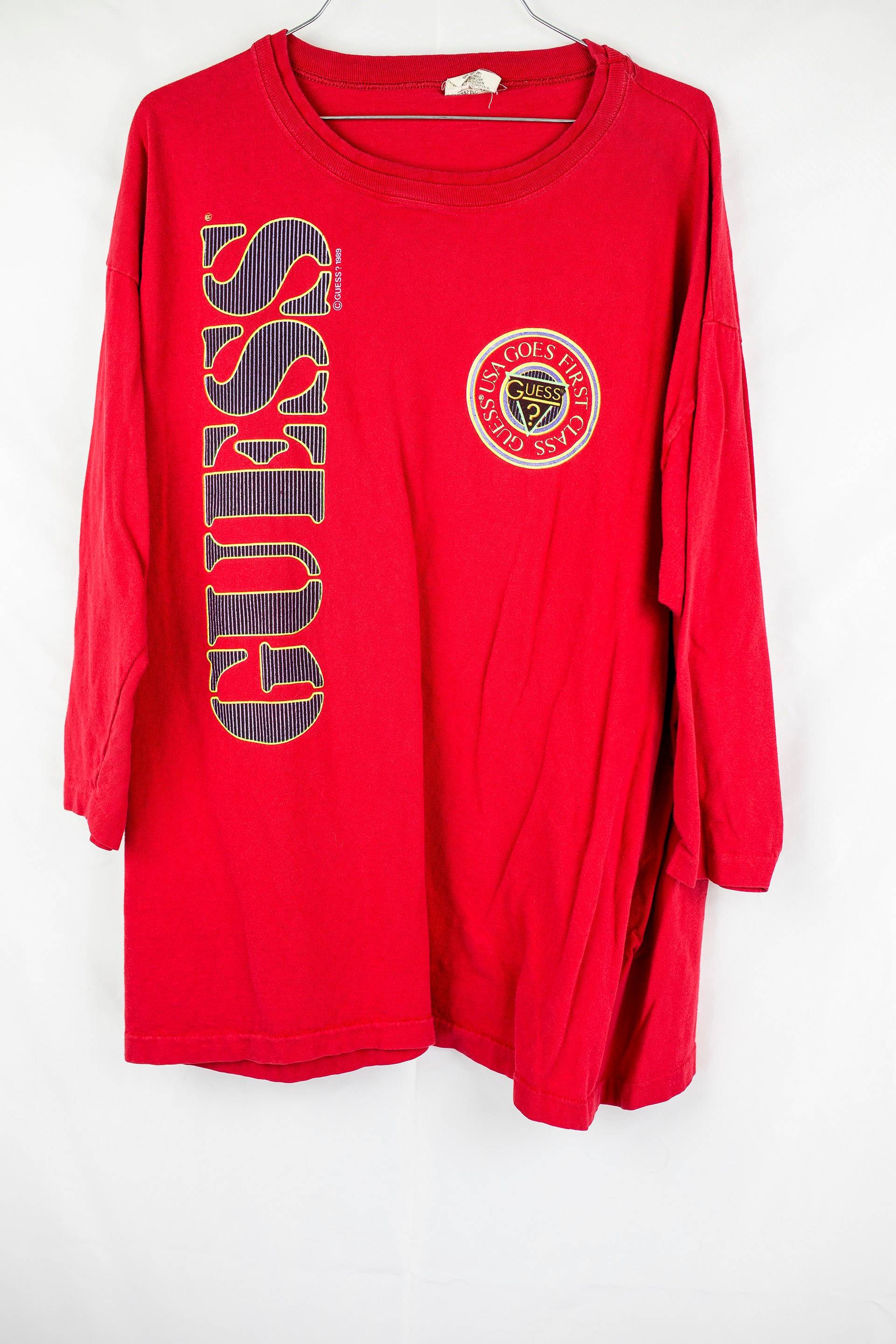 Vintage 1989 Guess Jeans 3/4 Arm Weithals T-Shirt Osfa Vintage 1989 Guess Jeans 3/4 Arm Weithals T-Shirt Osfa von FreshFitsMN