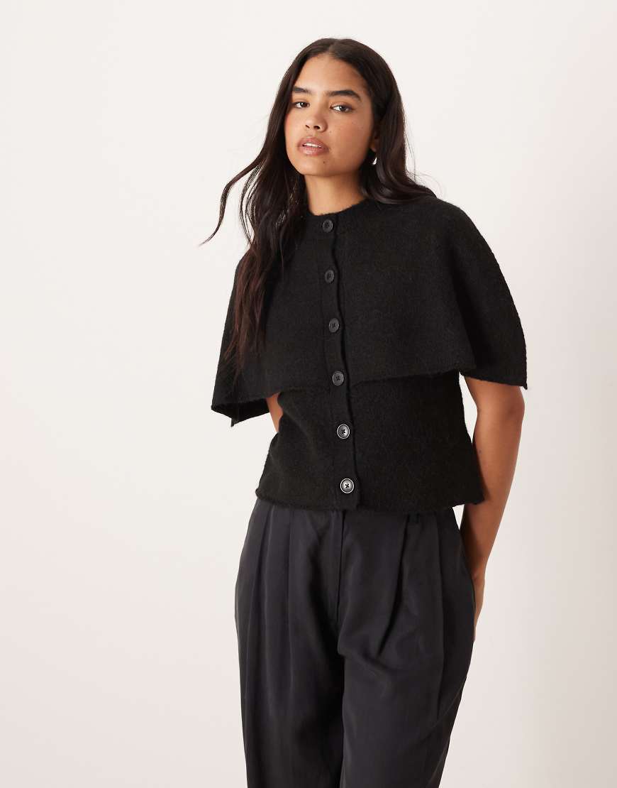 Gina Tricot - Cape-Strickjacke in Schwarz aus Woll-Alpakamix Gina Tricot - Cape-Strickjacke in Schwarz aus Woll-Alpakamix von GINA TRICOT