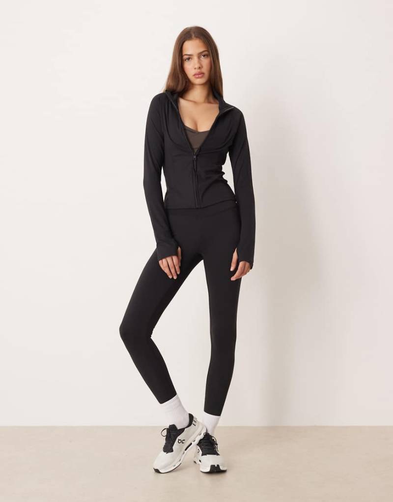 Gina Tricot - Geraffte Yoga-Leggings in Schwarz mit hohem Bund, Kombiteil Gina Tricot - Geraffte Yoga-Leggings in Schwarz mit hohem Bund, Kombiteil von GINA TRICOT
