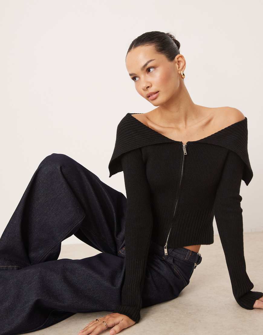 Gina Tricot - Gerippte Strickjacke in Schwarz mit Reißverschluss vorne und schulterfreiem Design mit Kragen von GINA TRICOT