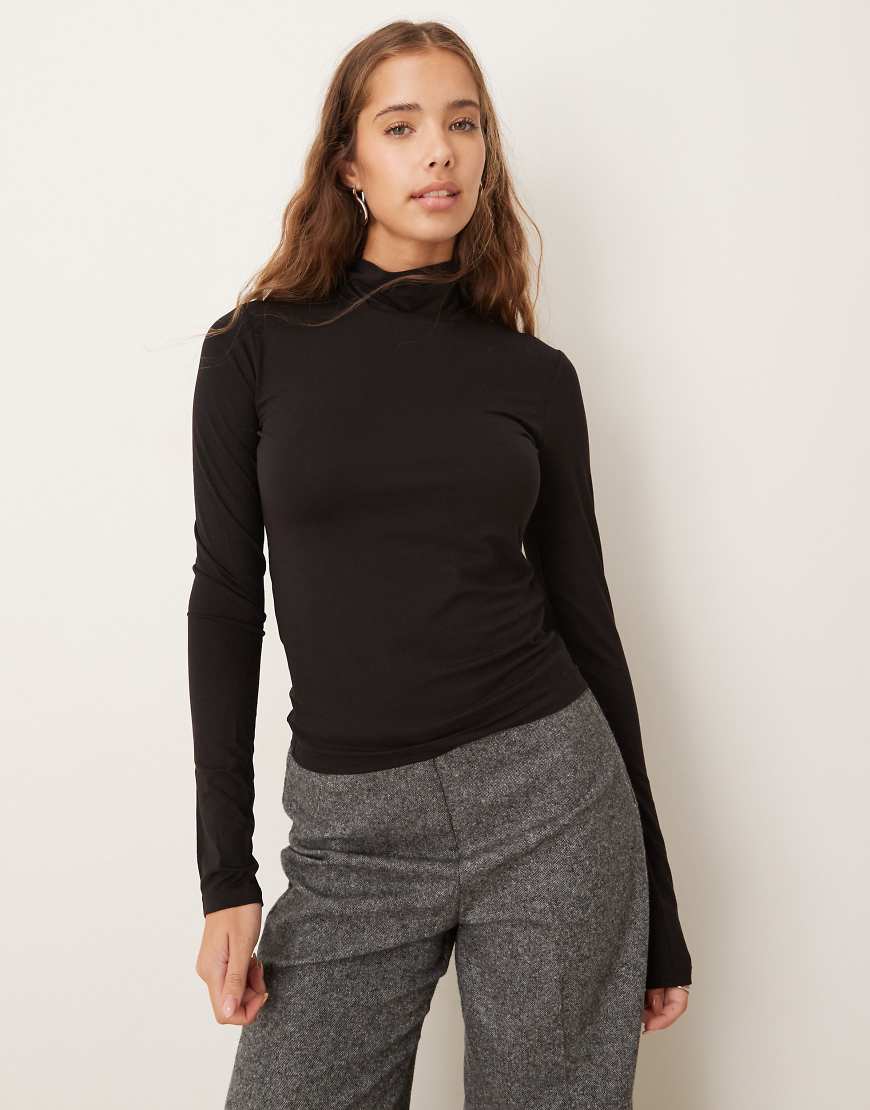 Gina Tricot - Langärmliges Oberteil aus weichem Jersey in Schwarz mit hohem Kragen von GINA TRICOT