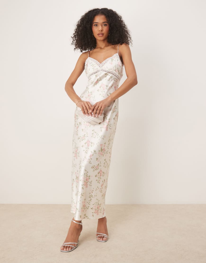 Gina Tricot - Satin-Maxikleid in Weiß mit Spitzenborte und Blumenmuster Gina Tricot - Satin-Maxikleid in Weiß mit Spitzenborte und Blumenmuster von GINA TRICOT