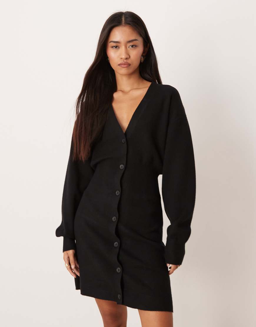 Gina Tricot - Mini-Strickkleid in Schwarz mit Knopfleiste, V-Ausschnitt und langen Trompetenärmeln von GINA TRICOT