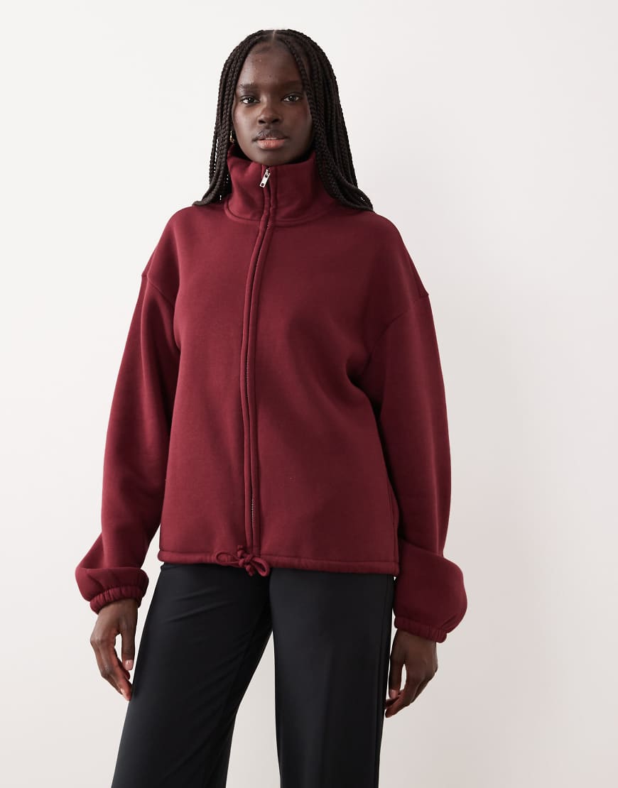 Gina Tricot - Sport-Oberteil aus weichem Fleece-Flor in Burgunderrot mit durchgehendem Reißverschluss von GINA TRICOT