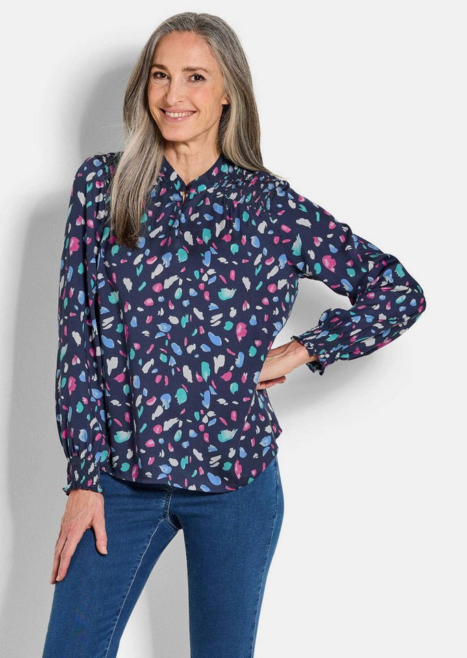 GOLDNER Klassische Bluse Elegante Satinbluse mit Smok-Details Viskosebluse mit Tupfenmuster, Stehkragen und Langarm GOLDNER Klassische Bluse Elegante Satinbluse mit Smok-Details Viskosebluse mit Tupfenmuster, Stehkragen und Langarm von GOLDNER