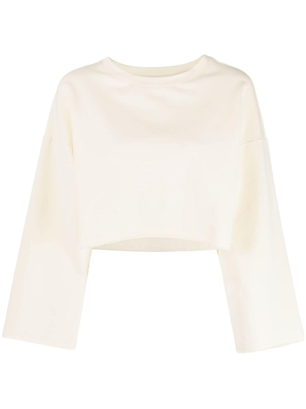 GOODIOUS Cropped-Pullover mit offenem Saum - Nude von GOODIOUS