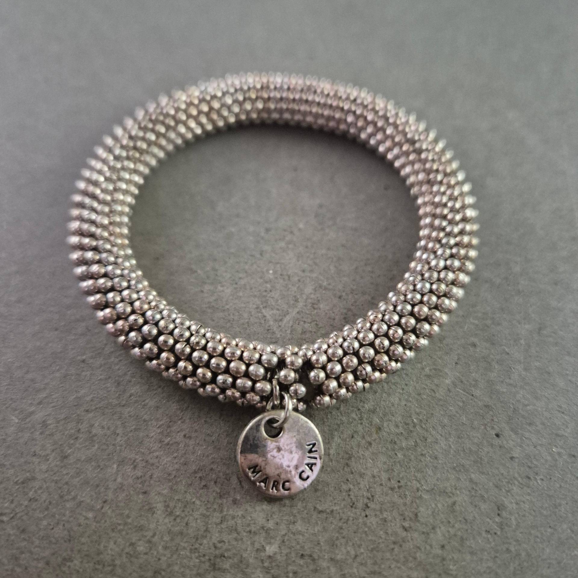 Marc Cain Armband - Silberfarbiges Kugeldesign Mit Logoanhänger von GalleryJarrodi