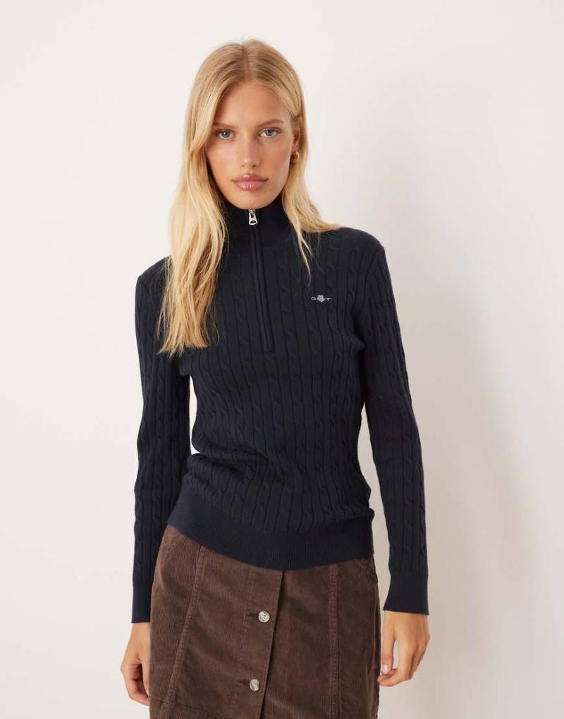 GANT - Pullover aus Baumwolle in Marineblau mit Zopfstrickmuster und halblangem Reißverschluss GANT - Pullover aus Baumwolle in Marineblau mit Zopfstrickmuster und halblangem Reißverschluss von Gant