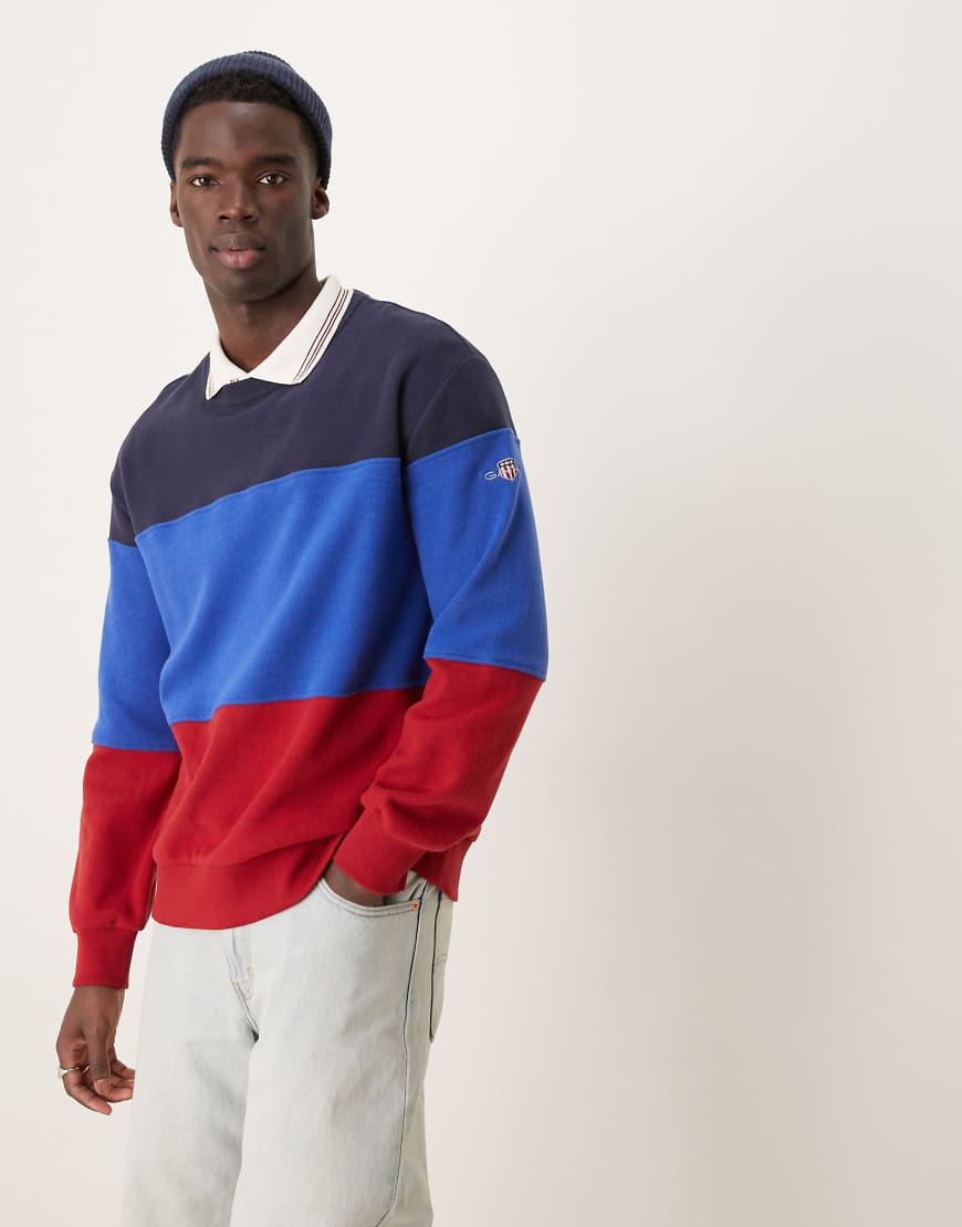 GANT - Sweatshirt in Blau und Rot mit Farbblockdesign und Logo GANT - Sweatshirt in Blau und Rot mit Farbblockdesign und Logo von Gant