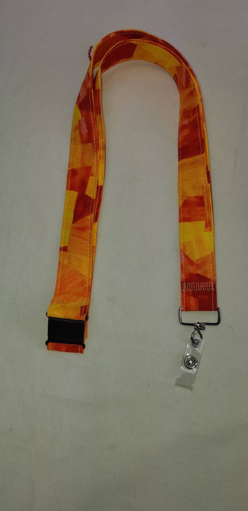 Lanyard Ausweishalter Ausbrecher Lehrer Bunt Stoff Vielseitig Einsetzbar Orange/Gelb/Rot Lanyard Ausweishalter Ausbrecher Lehrer Bunt Stoff Vielseitig Einsetzbar Orange/Gelb/Rot von GatorHealth