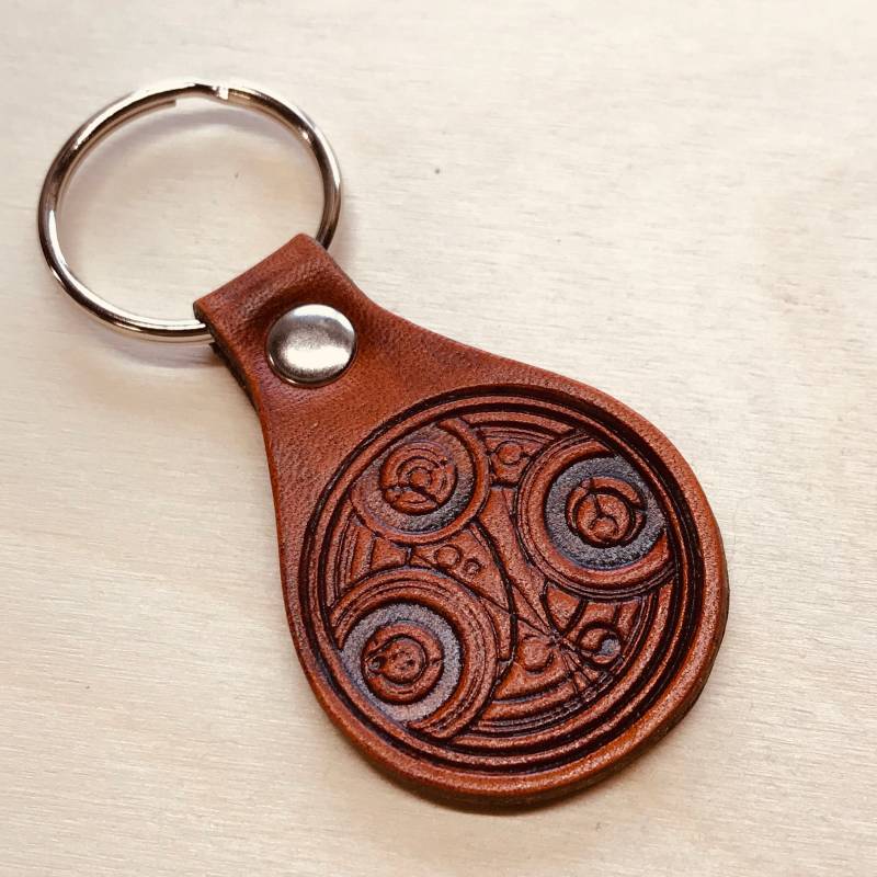 Dr. Who Gallifreyan Schlüsselanhänger Dr. Who Gallifreyan Schlüsselanhänger von GeekPinsUnlimited