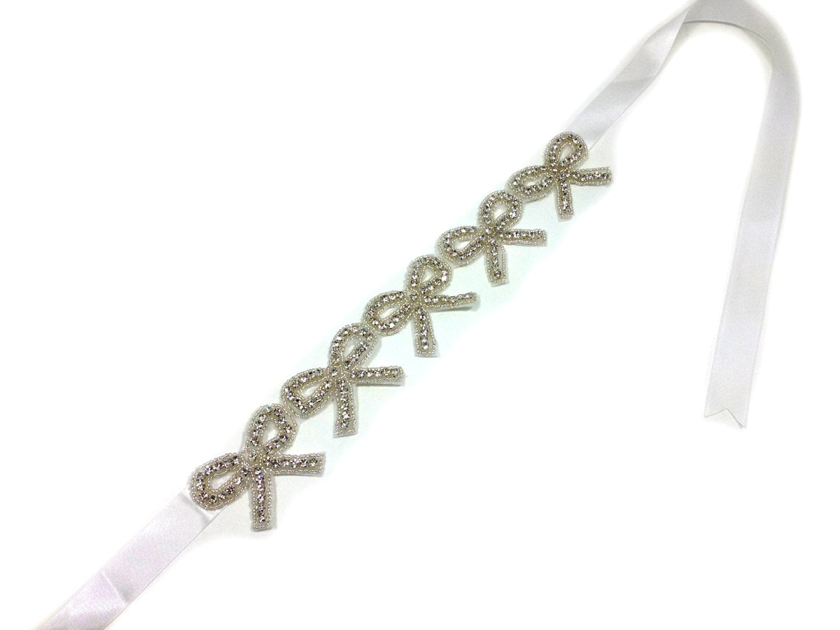 Crystal Strass Bögen Stirnband. Schleifenband Kristalle Brautstirnband, Elegante Schärpe, Glitzernde Hochzeitskleid Schärpe Crystal Strass Bögen Stirnband. Schleifenband Kristalle Brautstirnband, Elegante Schärpe, Glitzernde Hochzeitskleid Schärpe von GemoftheGarden