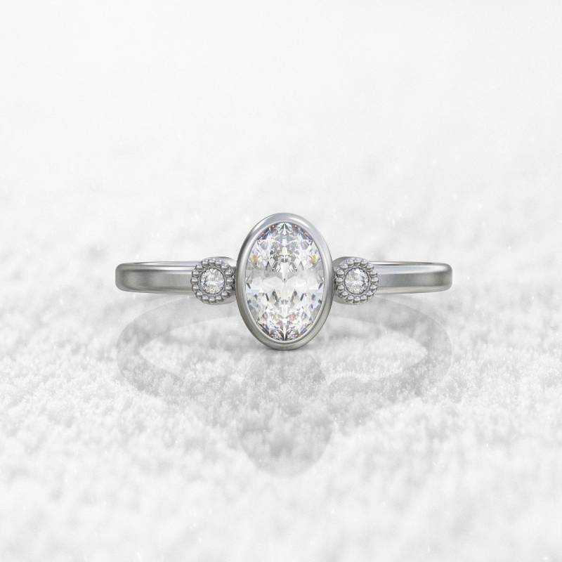 Chic Halbkaräter Oval Moissanit Ring Mit Seitlichen Diamanten von GioielliRings