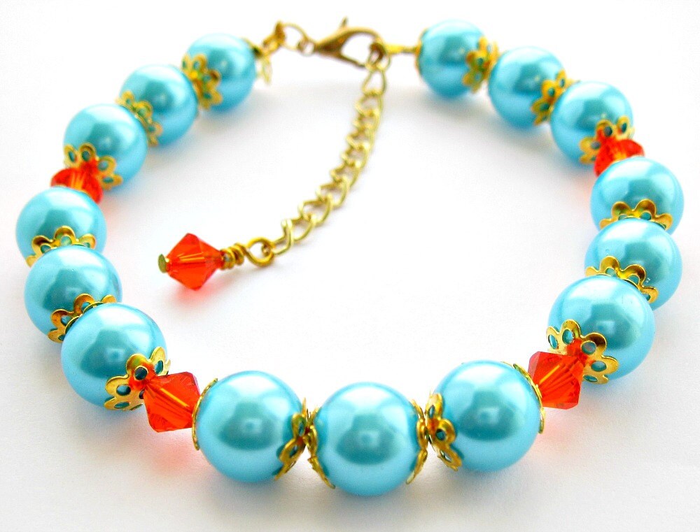 Türkisfarbenes Perlenarmband Orangefarbener Kristallakzent, Goldfarbenes Detail Türkisfarbenes Perlenarmband Orangefarbener Kristallakzent, Goldfarbenes Detail von GnosisCraftsandGifts