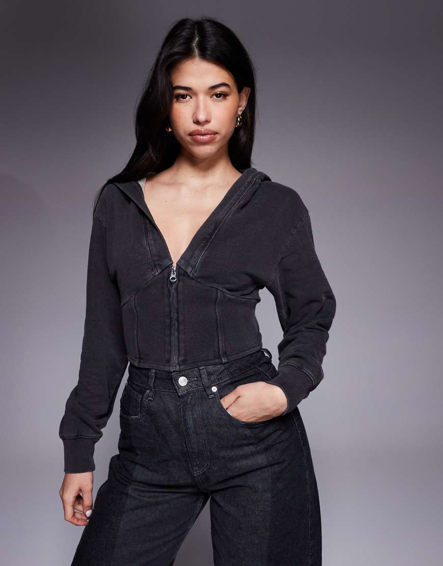 Good American - Cropped-Kapuzenjacke aus reiner Baumwolle in Schwarz mit V-Ausschnitt, Kombiteil von Good American