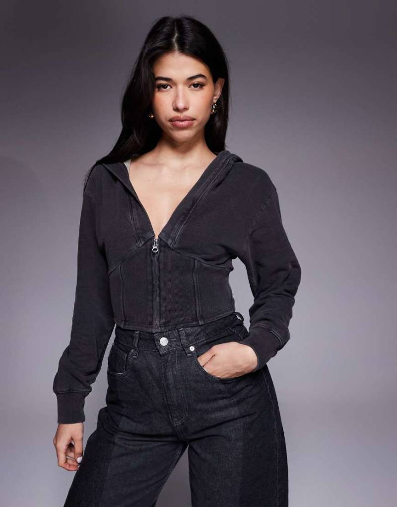 Good American - Cropped-Kapuzenjacke aus reiner Baumwolle in Schwarz mit V-Ausschnitt, Kombiteil von Good American