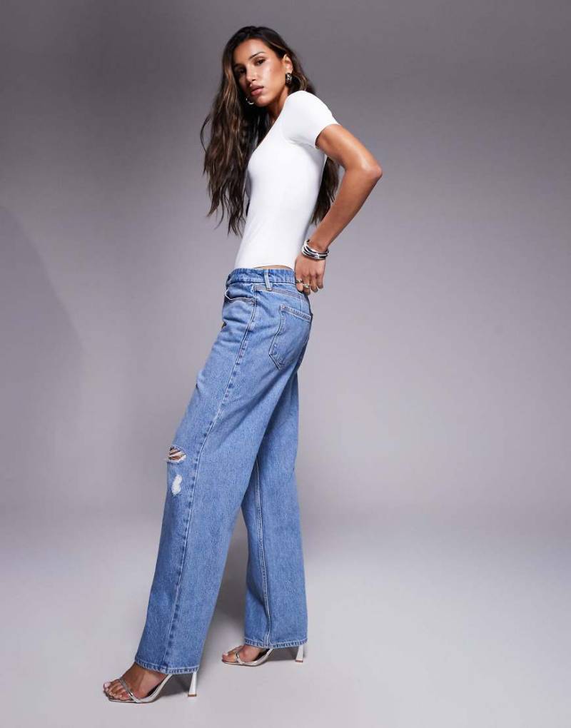 Good American - Good 90s - Locker geschnittene Jeans in Mittelblau Good American - Good 90s - Locker geschnittene Jeans in Mittelblau von Good American
