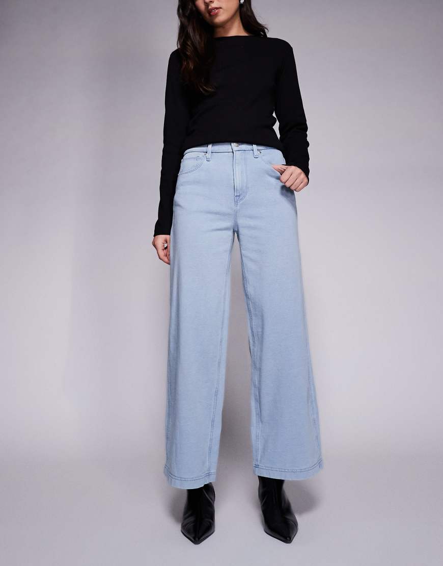 Good American - Good Standard - Gerade geschnittene Jeans aus Baumwolle in hellblauer Waschung, Kombiteil von Good American