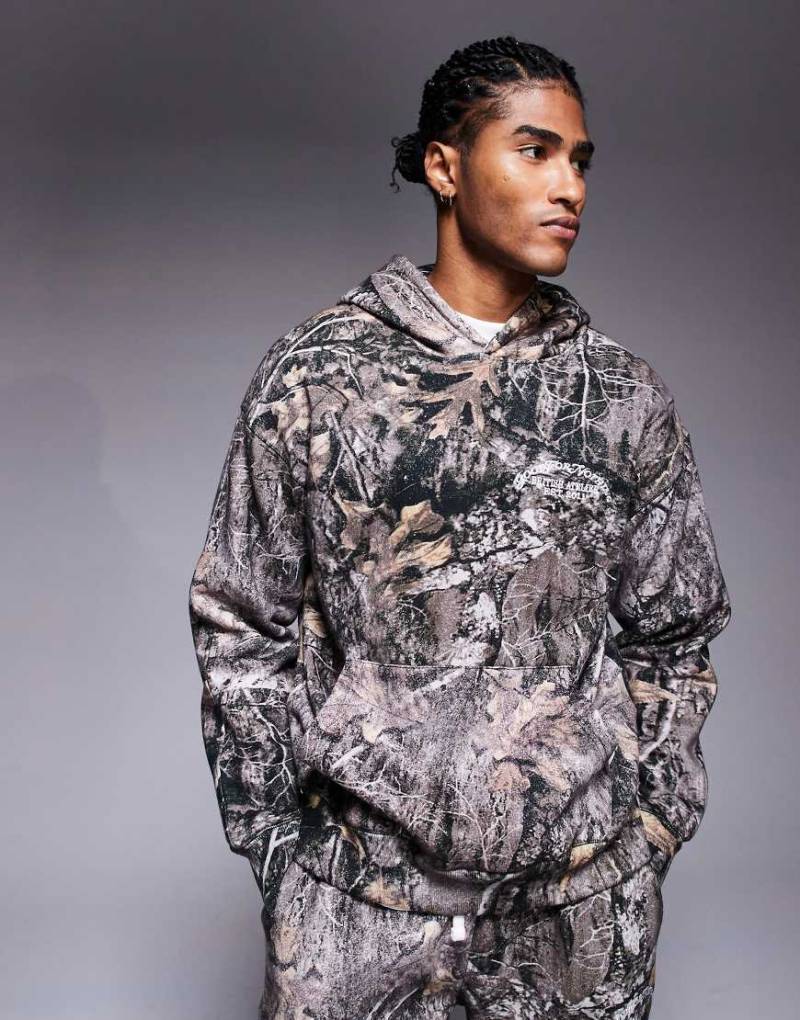 Good For Nothing - Oversize-Kapuzenpullover mit Military-Muster-Bunt von Good For Nothing