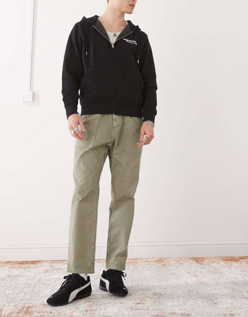 Gramicci - Locker, schmal zulaufende Cargo-Hose in Grün von Gramicci