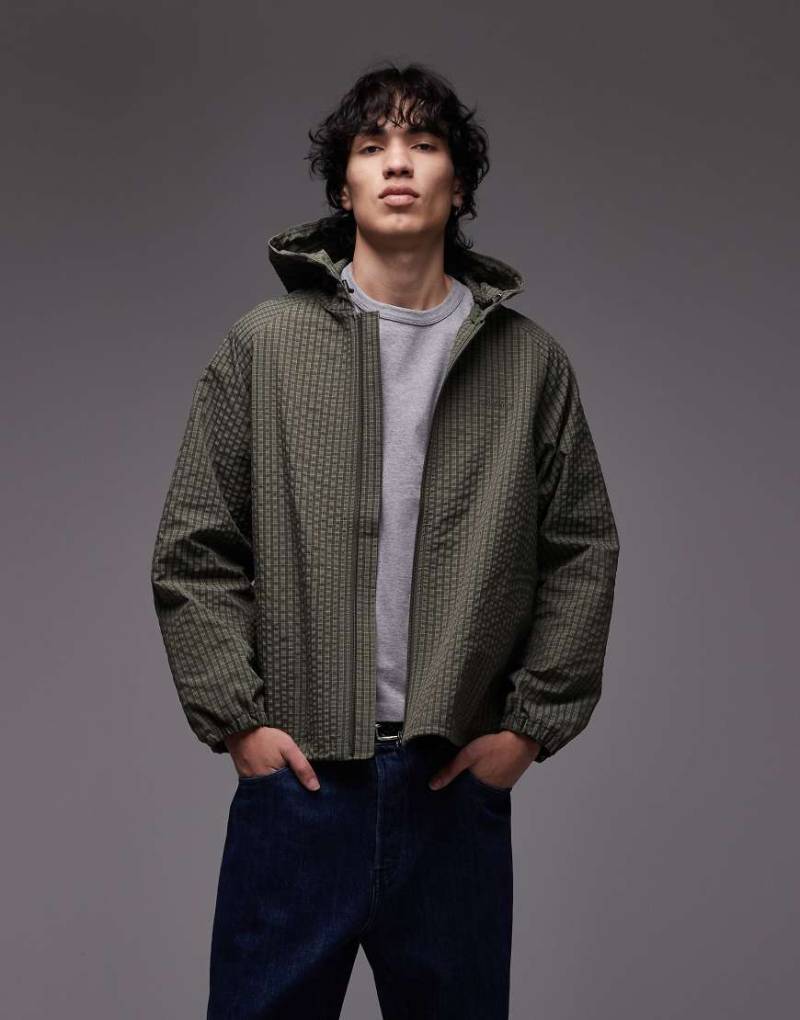 Gramicci - Northside - Utility-Jacke in Grün mit Kapuze und kleinem Karomuster-Bunt von Gramicci