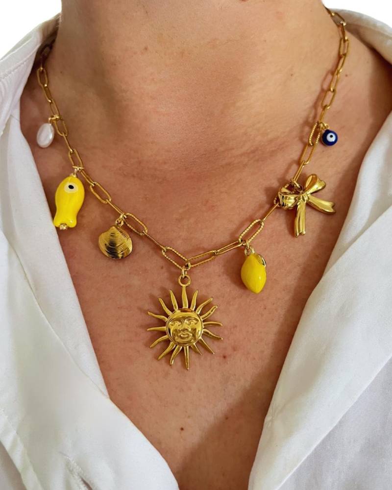 Grigris Sonnenkette Quasten Charms Glücksbringer Edelstahl - Grigri Chic Woman, Goldene Quasten, Kette Grigris Sonnenkette Quasten Charms Glücksbringer Edelstahl - Grigri Chic Woman, Goldene Quasten, Kette von GrigriChicBijoux