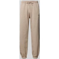 Guess Activewear Relaxed Fit Sweatpants mit Label-Print Modell 'EMIS' in Beige, Größe M von Guess Activewear